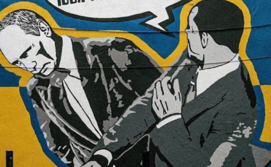 Графити изобразяващо сцена в която Уил Смит шамаросва руския президент